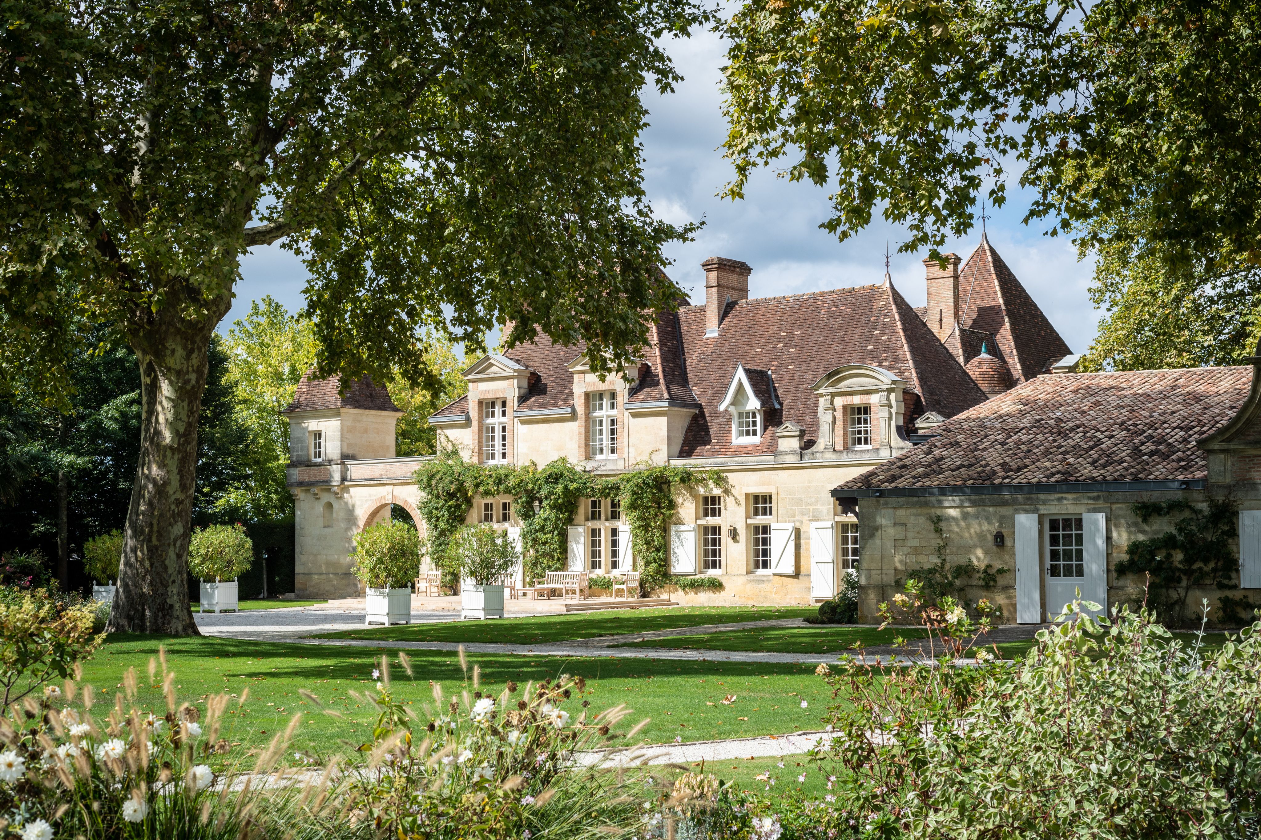 woman in black bikini top on body of water during daytime